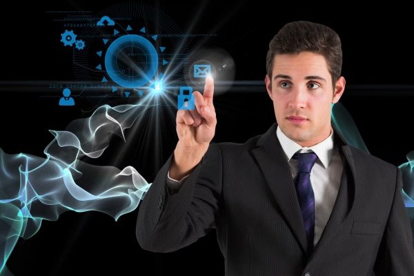 a man in a suit touching a glowing screen